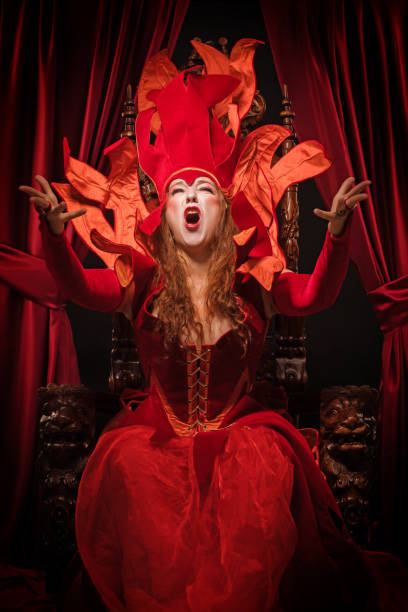 istock Queen of Hearts type character on the throne 1279311548