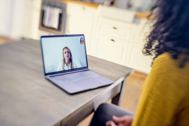 istock Woman making video call on laptop computer 1279311762