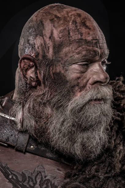istock Older bloody Viking Odin warrior in studio shot 1279313098
