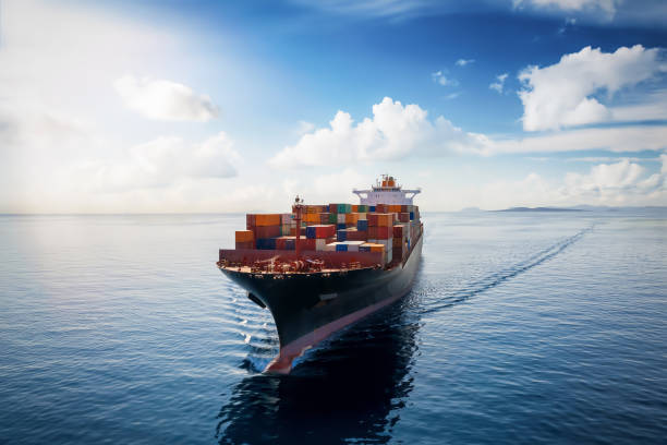 istock Aerial view of a container cargo ship traveling over open ocean 1279313179
