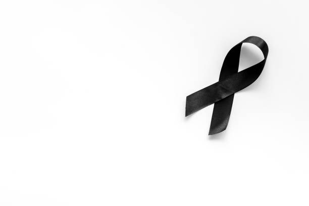 istock Black ribbon as mourning symbol top view 1279313289