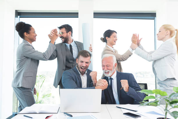 istock Business people doing a victory clasp 1279314837