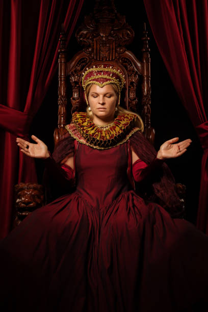 istock Historical Queen character on the throne 1279315613