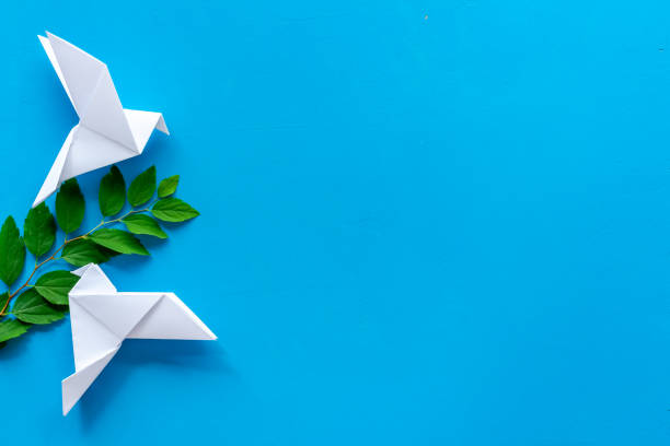istock Origami concept. Paper birds top view, copy space 1279316795