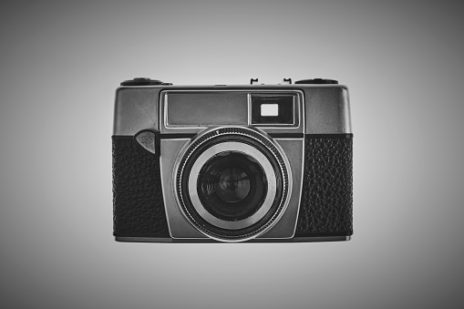 View of vintage camera on a white background with vignette