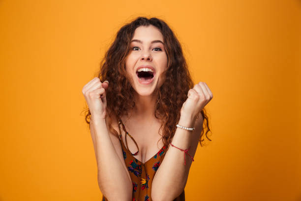 istock Excited young lady make winner gesture. 1279318086