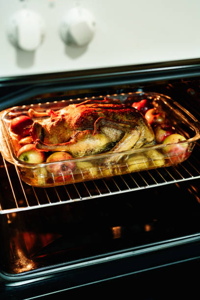 istock Duck baked in fat with apples and potatoes. 1279318493