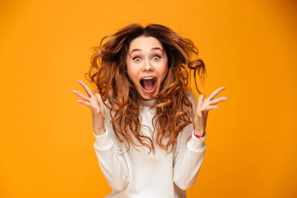 istock Screaming young woman standing isolated 1279320258