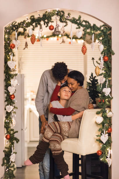 istock Beautiful mixed race family at Christmas 1279322400