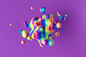 Abstract background of a splash of multicolored rainbow liquid