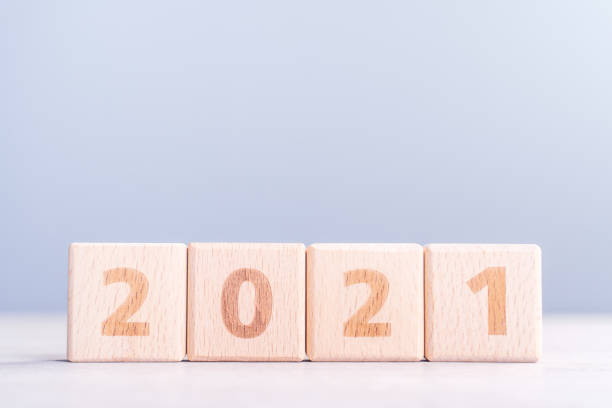 istock 2021 New year abstract design concept by wooden blocks with copy space. 1279336048