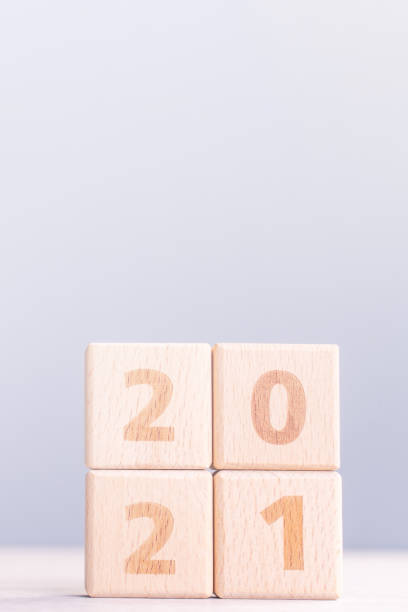 istock 2021 New year abstract design concept by wooden blocks with copy space. 1279336182