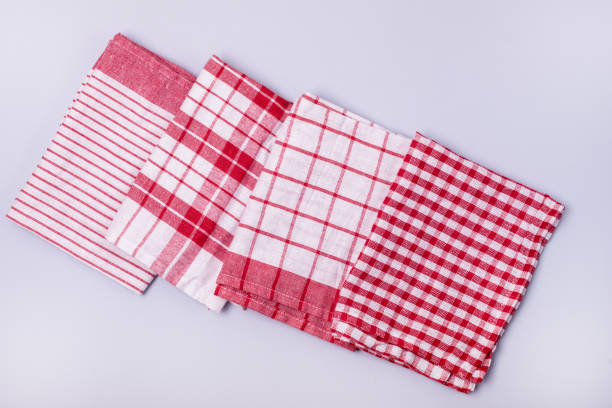 istock Four Folded Red White Napkin or Towels on Blue Background Top View Horizontal 1279337980