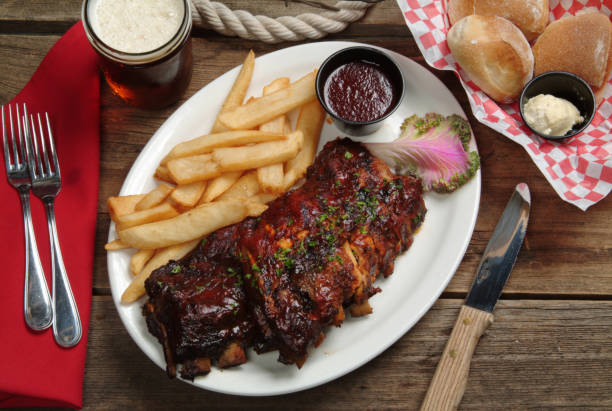 istock A place setting with a full rack of BBQ ribs and fries 1279338930