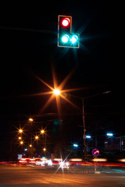 istock Green light - red light to light lamps on the streets at night. 1279340033