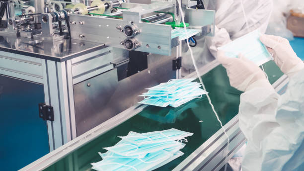 istock Face mask production line in modern factory 1279340225