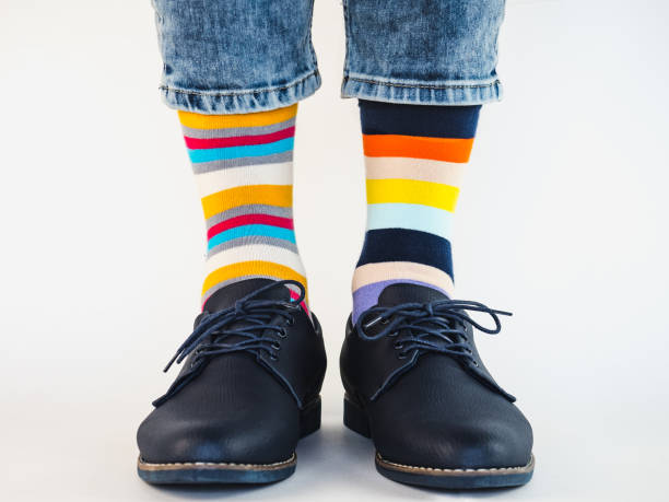 istock Men's legs, trendy shoes and bright socks 1279340230