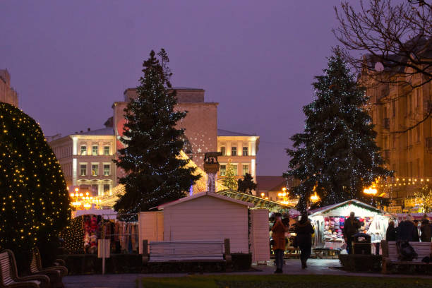 istock Festive night city lights on Advent fair 1279340369