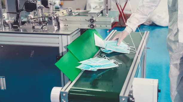 istock Face mask production line in modern factory 1279341471