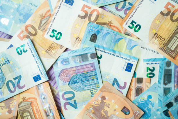 istock Colorful various value of euro money note close up spread background 1279343155
