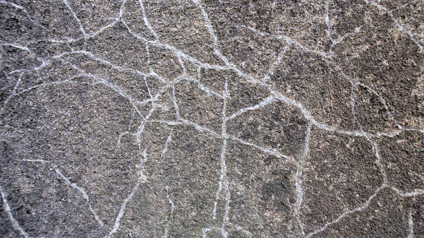 istock Abstract background Cracked of stone wall texture. 1279343156