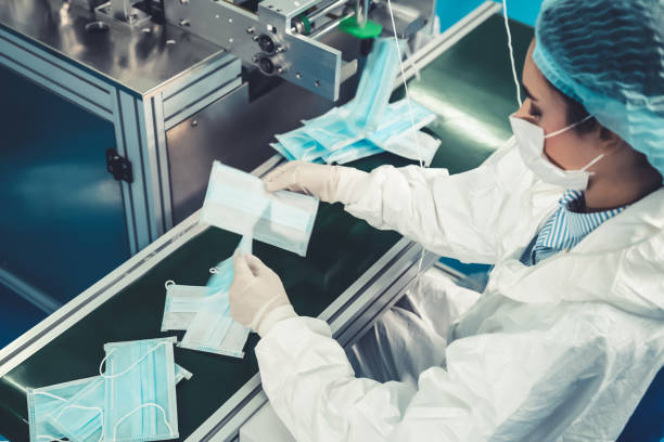 istock Face mask production line in modern factory 1279344055