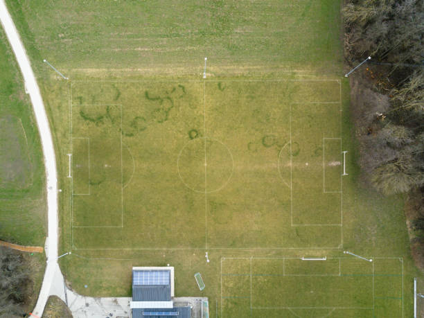 istock Aerial image of soccer grass field. 1279346235