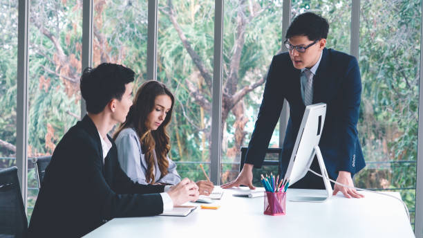 istock Angry business person dispute work problem in group meeting 1279346282