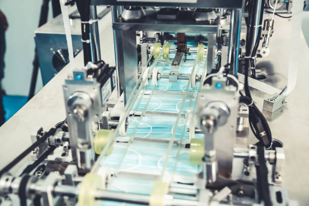 istock Face mask production line in modern factory 1279346340