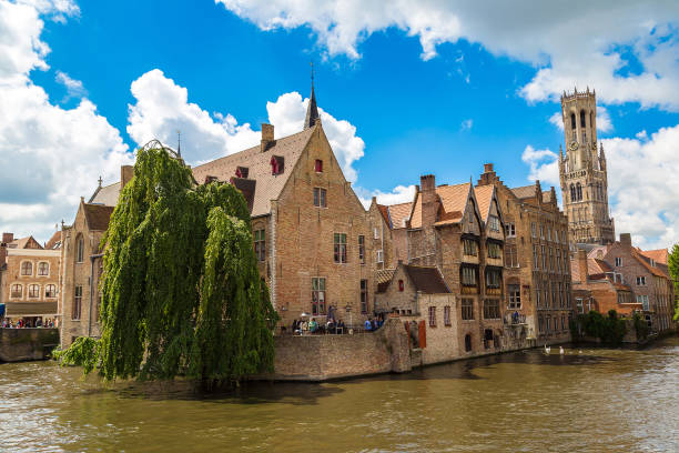 istock Canal in Bruges and Belfry tower 1279346438