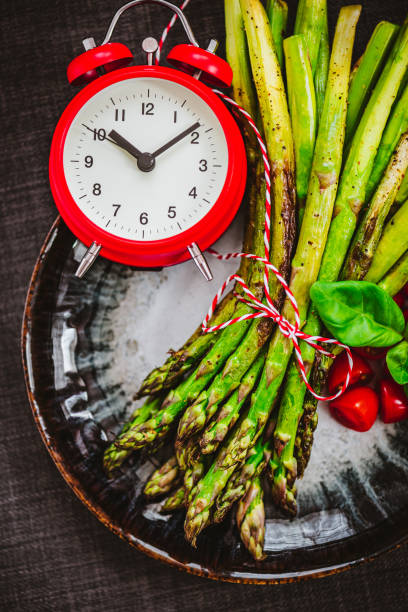 istock Intermittent Fasting Topic with Low Carb Roasted Green Asparagus 1279351155