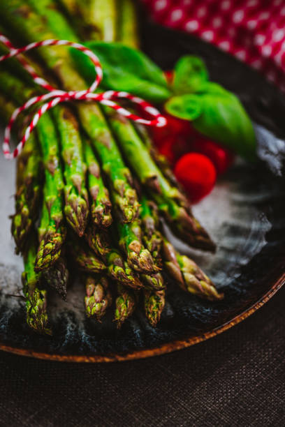 istock Grilled Asparagus with Cocktail Tomatoes 1279351284