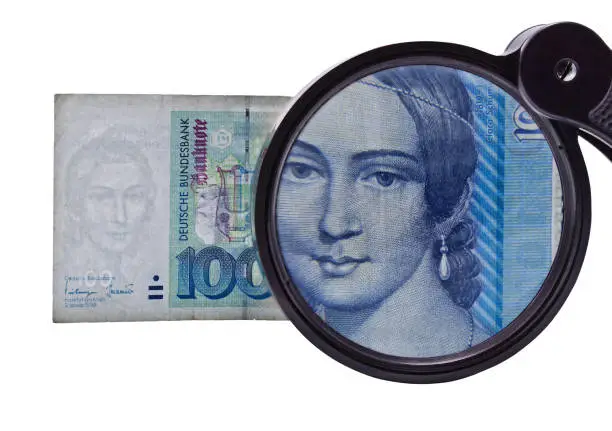 Photo of fifty Deutsche marks under the magnifying glass