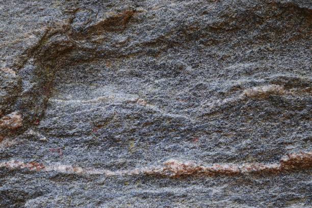 istock Close up view at a granite and stone wall texture in a high resolution. 1279355322