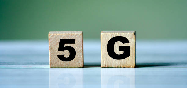 istock wooden blocks with the word 5G. High-speed mobile Internet. New generation networks. Big data technology concept. 1279359346