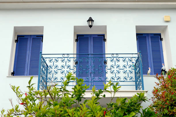 istock House with blue shutters, Galaxidhi, Greece 1279359971