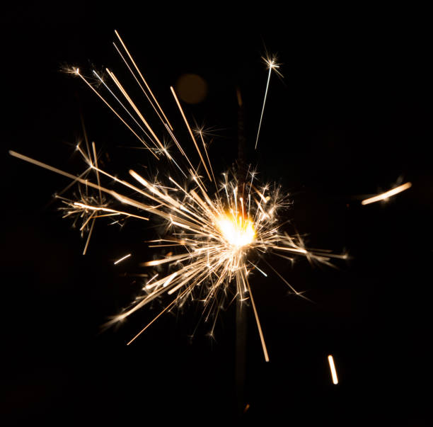 istock Bengal fire sparkles isolated on black background. Fascinating Bengal Fire Dance 1279361262