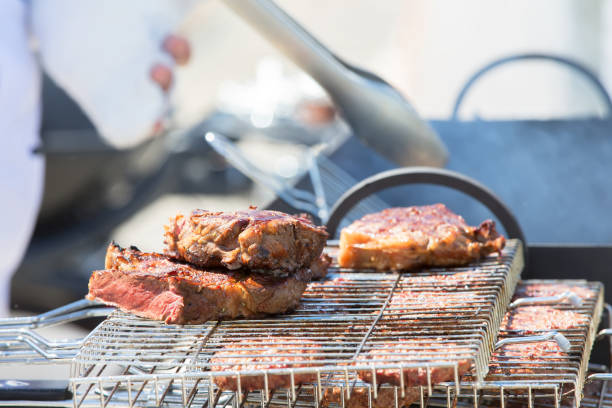 istock Grilled meat. Cooking beef or pork on the grill. 1279363862