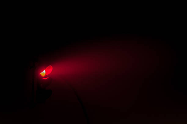 istock traffic lights in thick fog 1279365253