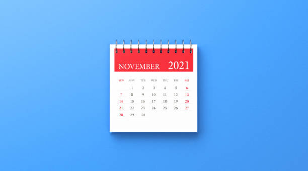 istock 2021 Ring Binder November Calendar on Blue Background 1279365568