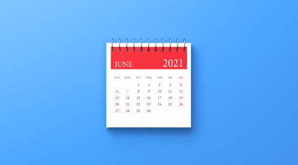 istock 2021 Ring Binder June Calendar on Blue Background 1279365854