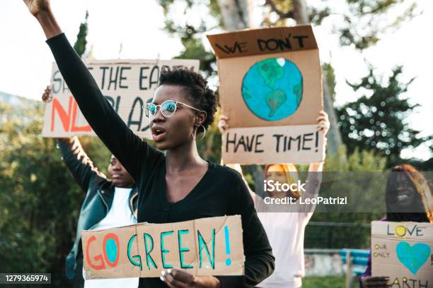 Activists Demonstrating Against Global Warming Stock Photo - Download Image Now - Protest, Climate Change, Climate