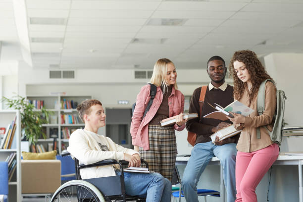 istock Diverse Group of Students in College Library 1279366062