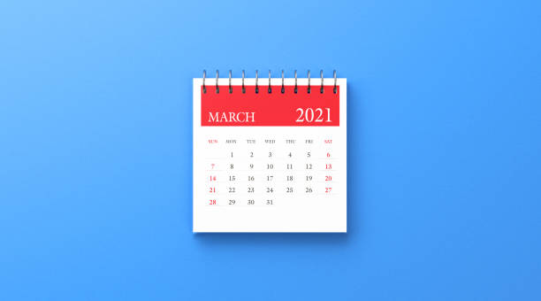 istock 2021 Ring Binder March Calendar on Blue Background 1279366132