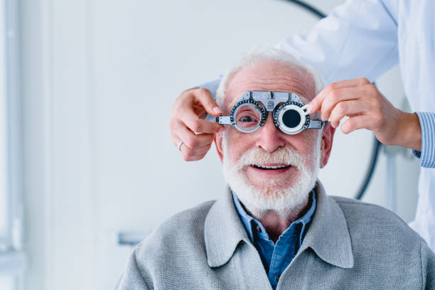 istock Portrait of a mature man fitting ophthalmic spectacles with doctor`s help 1279371120
