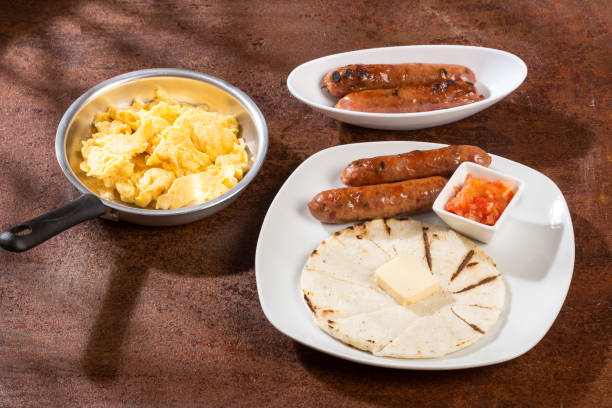 istock Tasty Colombian breakfast; White corn arepa with chorizo and scrambled eggs. 1279371848