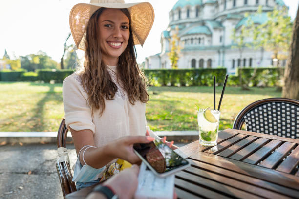 istock Woman making cashless payment 1279375731