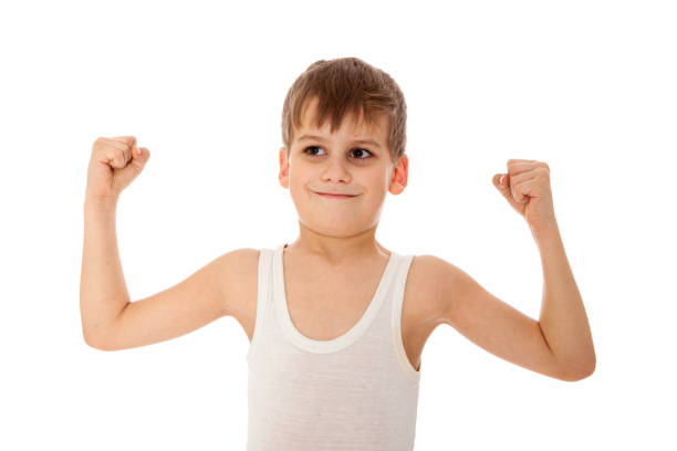 istock Boy showing his muscle 1279381056