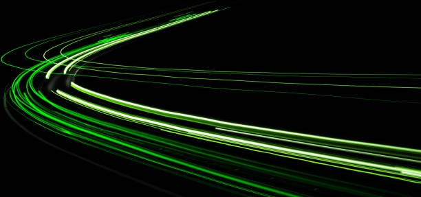 istock green car lights at night. long exposure 1279385150