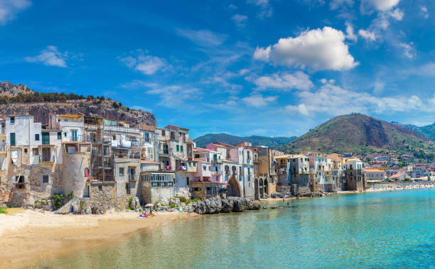 istock Sandy beach in Cefalu in Sicily 1279386348
